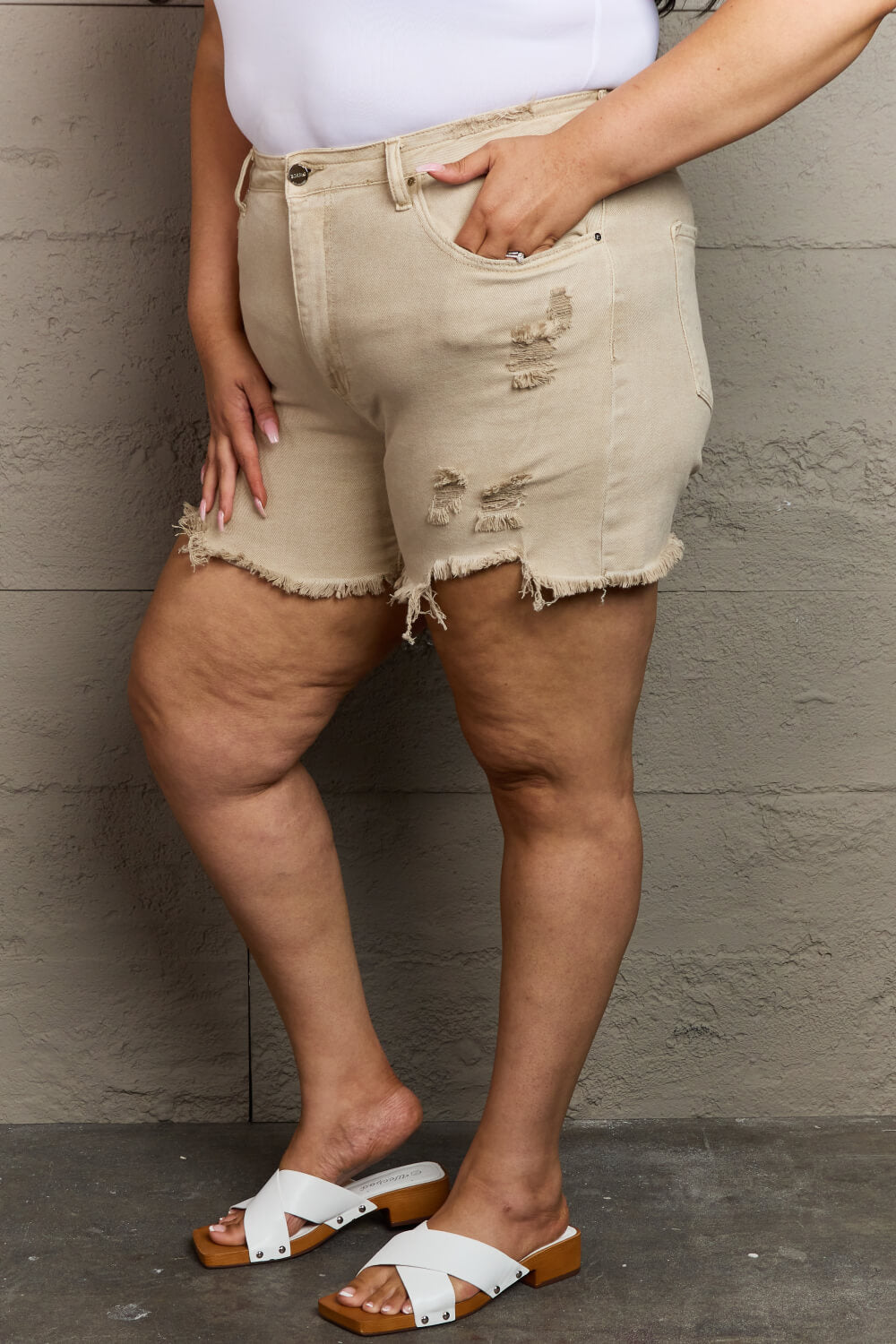 RISEN Katie Full Size High Waisted Distressed Shorts in Sand - The Boutie Shop