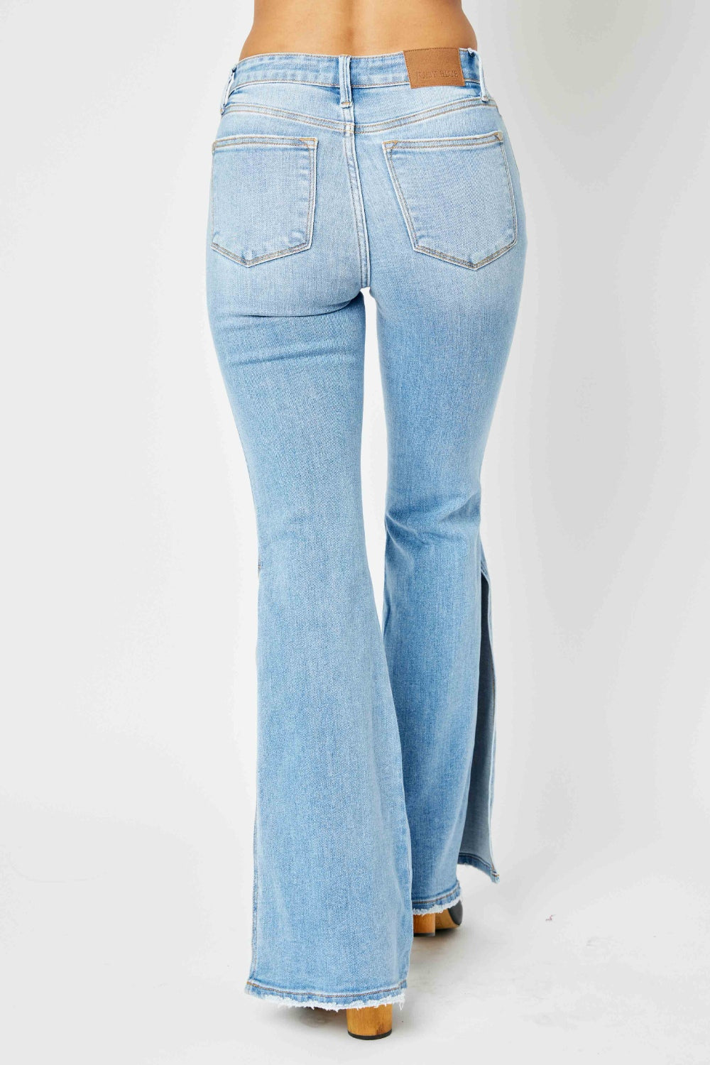 Judy Blue Full Size Mid Rise Raw Hem Slit Flare Jeans - The Boutie Shop